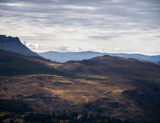 Explore the breathtaking wide-angle view of Esquel's mountainous Patagonian landscape in Chubut, Argentina.